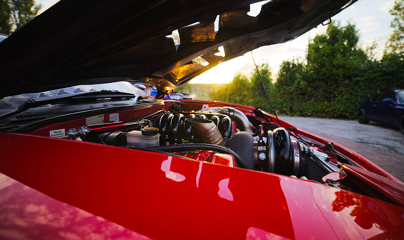 Red Car Engine with Turbocharger Red Car Engine with Turbocharger